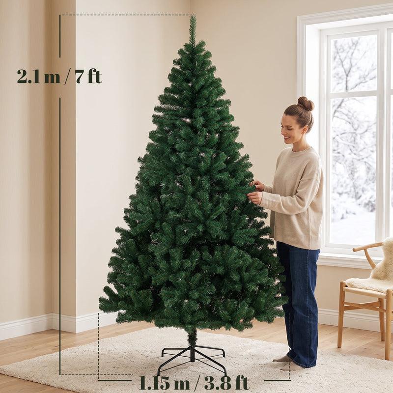 Dimensions of the 7ft Christmas tree: 2.1 m high and 1.15 m wide, with a woman shaping the branches