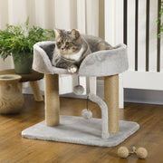 Grey British Shorthair cat resting on the plush platform of the cat tree