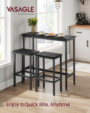 Vasagle bar table used as a breakfast table in a black and white kitchen