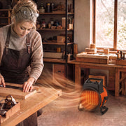 Industrial fan heater in use in a woodworking workshop