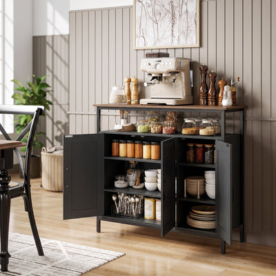 Black sideboard in a kitchen with doors open showing jars and plates on the shelves