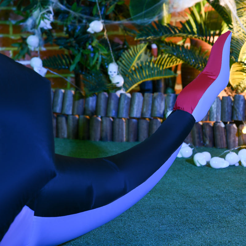 Close-up of one dragon wing in a decorated Halloween garden scene