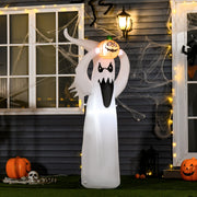 White inflatable ghost glowing beside a house doorway strung with fairy lights