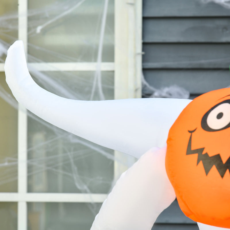 Close-up of the ghost's raised arm and the orange pumpkin it holds