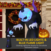 Ghost glowing on a porch beside an autumn wreath and a carved pumpkin