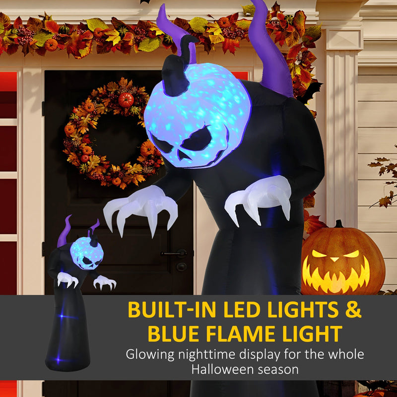 Ghost glowing on a porch beside an autumn wreath and a carved pumpkin