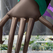 Close-up of the long inflatable clawed hand and purple sleeve