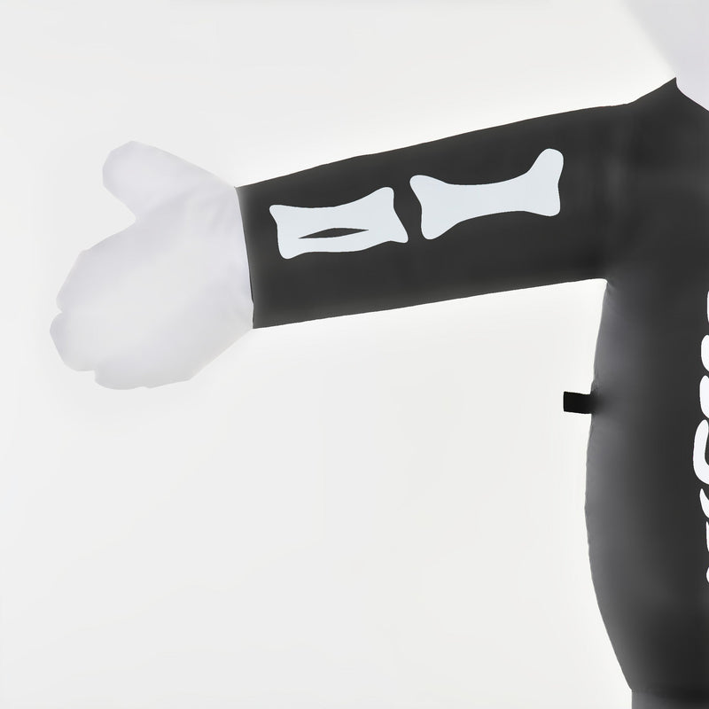 Detail of the inflatable arm with printed bone markings and white glove
