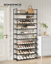 10-tier shoe rack in a hallway beside a white door and a sideboard