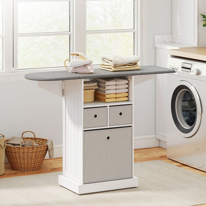 Ironing board cabinet with iron and folded towels beside a washing machine
