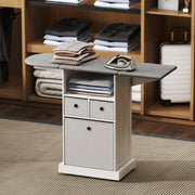 Ironing board cabinet folded compactly in a bedroom closet with towels