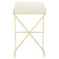 Ivory velvet bar stool with gold finish frame and footrest on a plain background