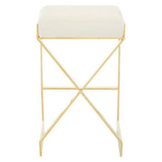 Ivory velvet bar stool with gold finish frame and footrest on a plain background