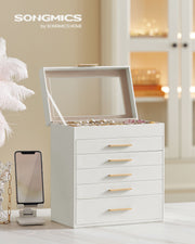 SONGMICS jewellery box with glass lid open, showing rings, earrings, and necklaces inside