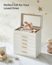 SONGMICS jewellery box open and filled with jewellery, styled as a gift with wrapped presents