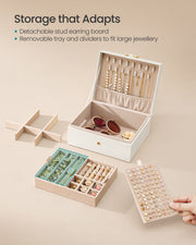 Removable top tray, dividers, and detachable stud earring board laid out beside the jewellery box