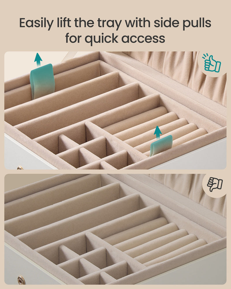 Close-up showing how to lift the jewellery tray using its side pulls for quick access