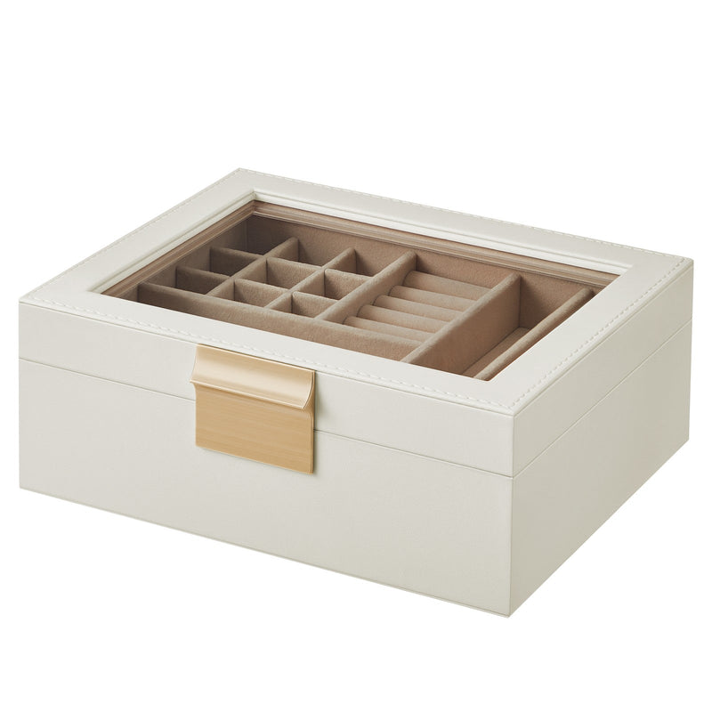 White and gold jewellery box with glass lid, closed, studio shot