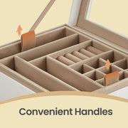 Close-up of the fabric pull handles used to lift the removable tray