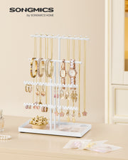Close-up of the velvet tray holding rings and earrings