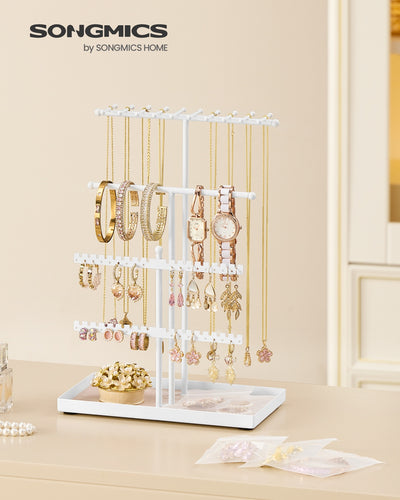 Close-up of the velvet tray holding rings and earrings