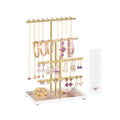 Pale gold jewellery stand with metal frame and velvet tray