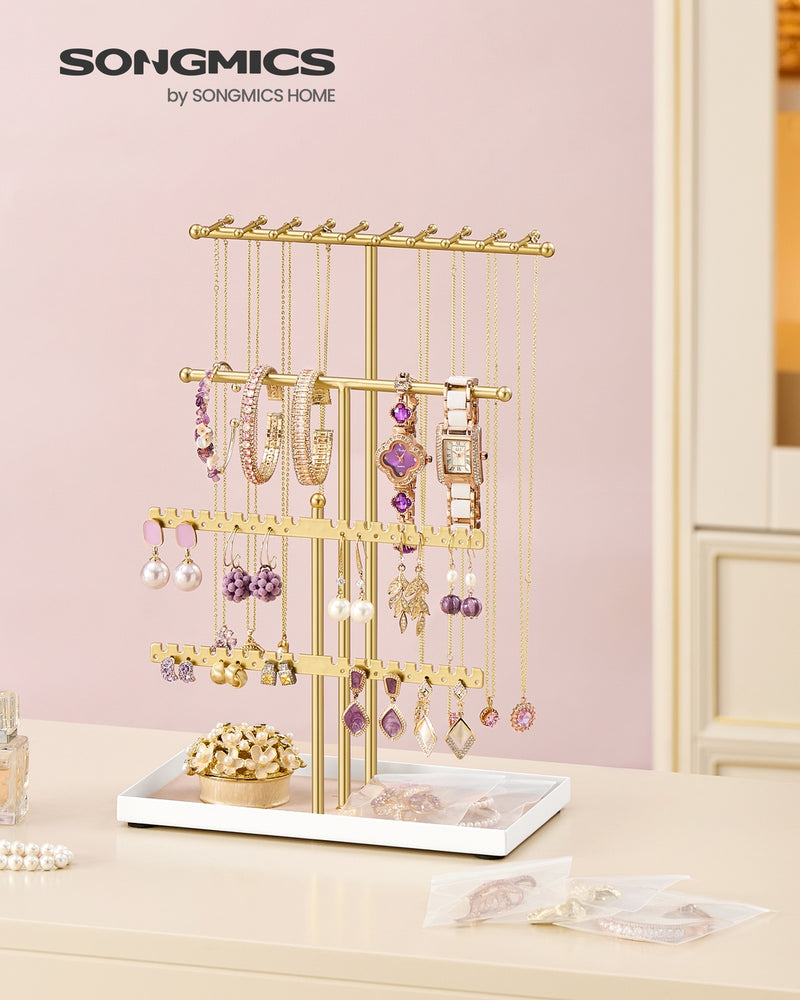 Close-up of the velvet tray holding rings and earrings