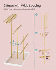 Necklaces hanging from the 3-tier metal T-bars