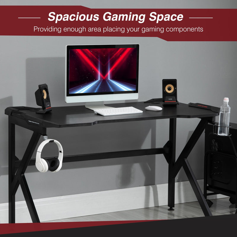 Spacious gaming space panel with a monitor, speakers and a water bottle in the side cup holder