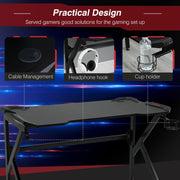 Practical design panel showing cable management, headphone hook and cup holder details