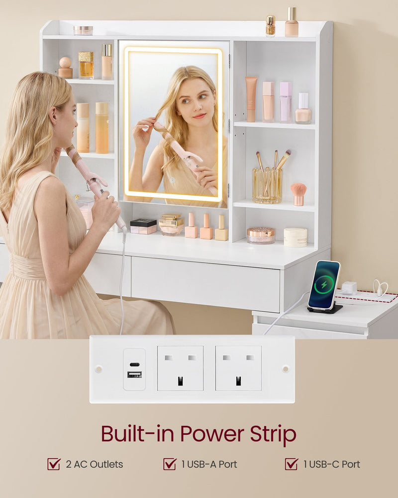Close-up of the built-in power strip with 2 UK sockets, a USB-A port and a USB-C port