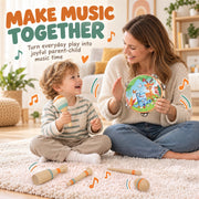 Parent and child making music with a tambourine and maracas