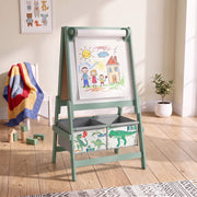 Green easel with a child's family drawing on the paper roll
