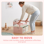 Adult lifting the pink toy box bench by its hollow side handles