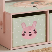 Close-up of the bunny-print fabric drawer on the pink bench