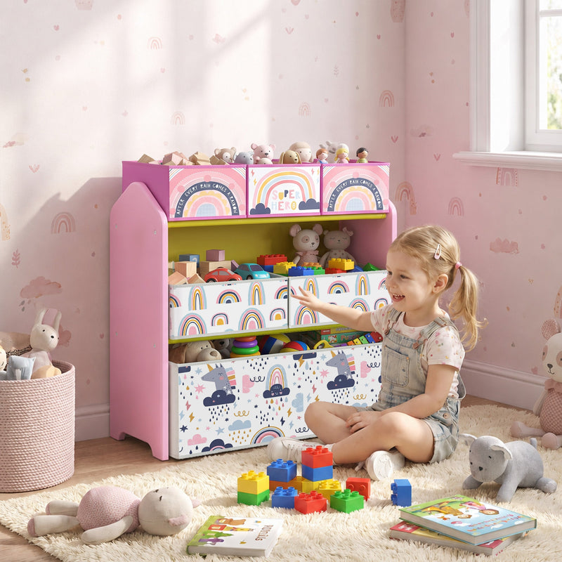 Girl playing with blocks in front of the pink toy storage rack