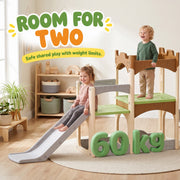 Two children on the playset with a 60 kg weight limit callout