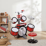 Red kids drum kit packaging and included parts