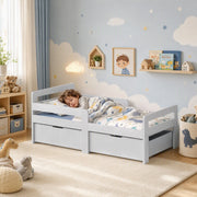 Child sleeping in the grey kids bed frame in a blue nursery