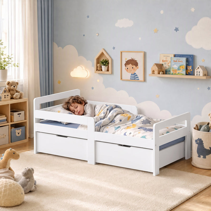 Child sleeping in the white kids bed frame in a blue nursery