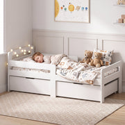 White kids bed with a sleeping child and teddy bears in a calm bedroom