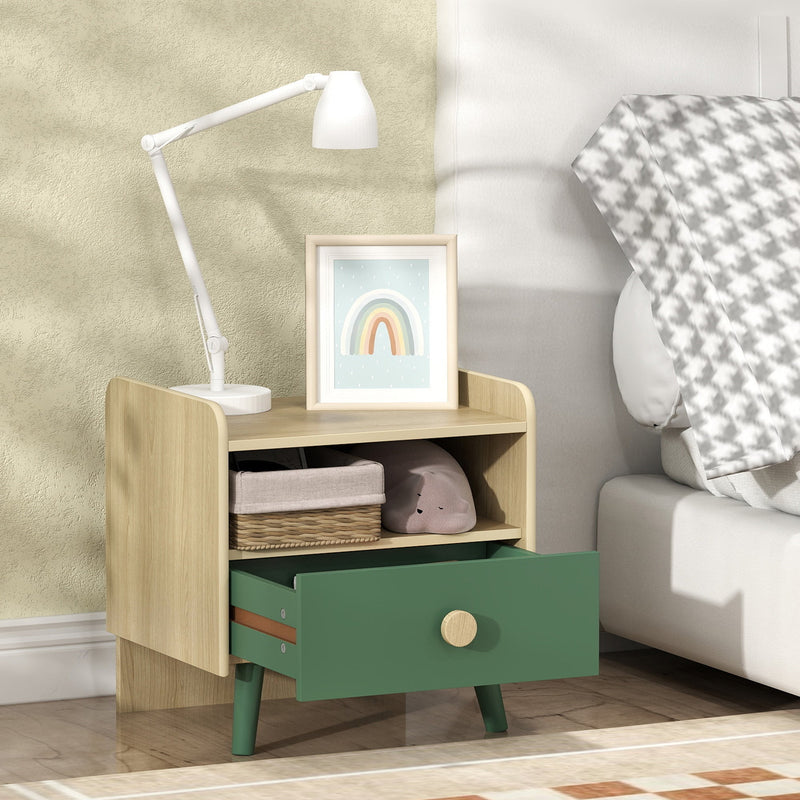 Green bedside table styled with a desk lamp, framed rainbow print and woven basket on the shelf