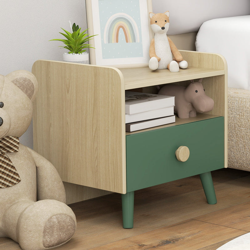 Green bedside table styled with books and a fox plush toy, teddy bear beside it