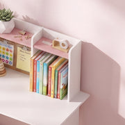 Close-up of the kids desk's over-desk bookshelf holding books and stationery