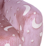Close-up of the soft pink velvet fabric with star and moon pattern