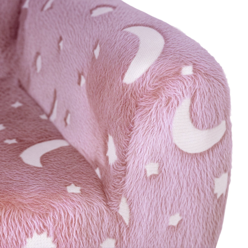 Close-up of the soft pink velvet fabric with star and moon pattern