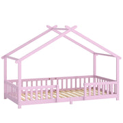 Pink wooden kids house bed frame with peaked roof and dual guardrails, studio shot