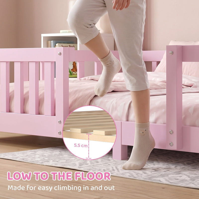 Close-up of the 5.5 cm floor clearance as a child steps into the pink bed frame