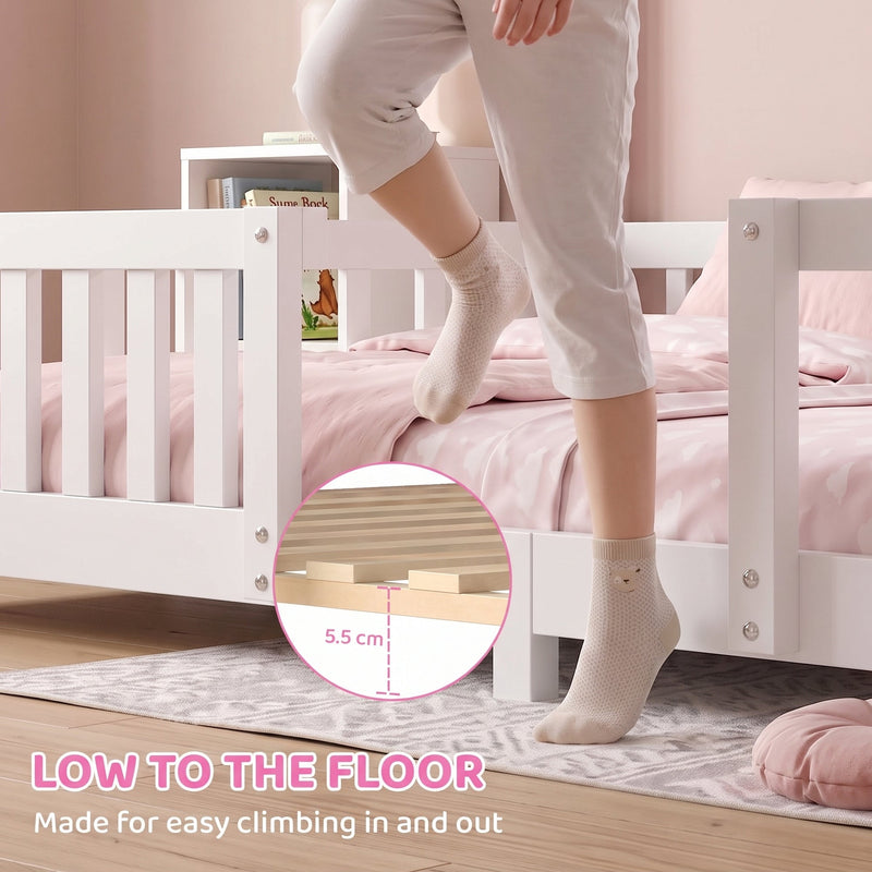 Close-up of the 5.5 cm floor clearance as a child steps into the white bed frame