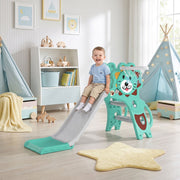 Toddler sliding down the blue Aiyaplay lion slide in a nursery-style playroom